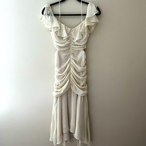 Whimsical white mermaid cut dress with side cutouts and lace